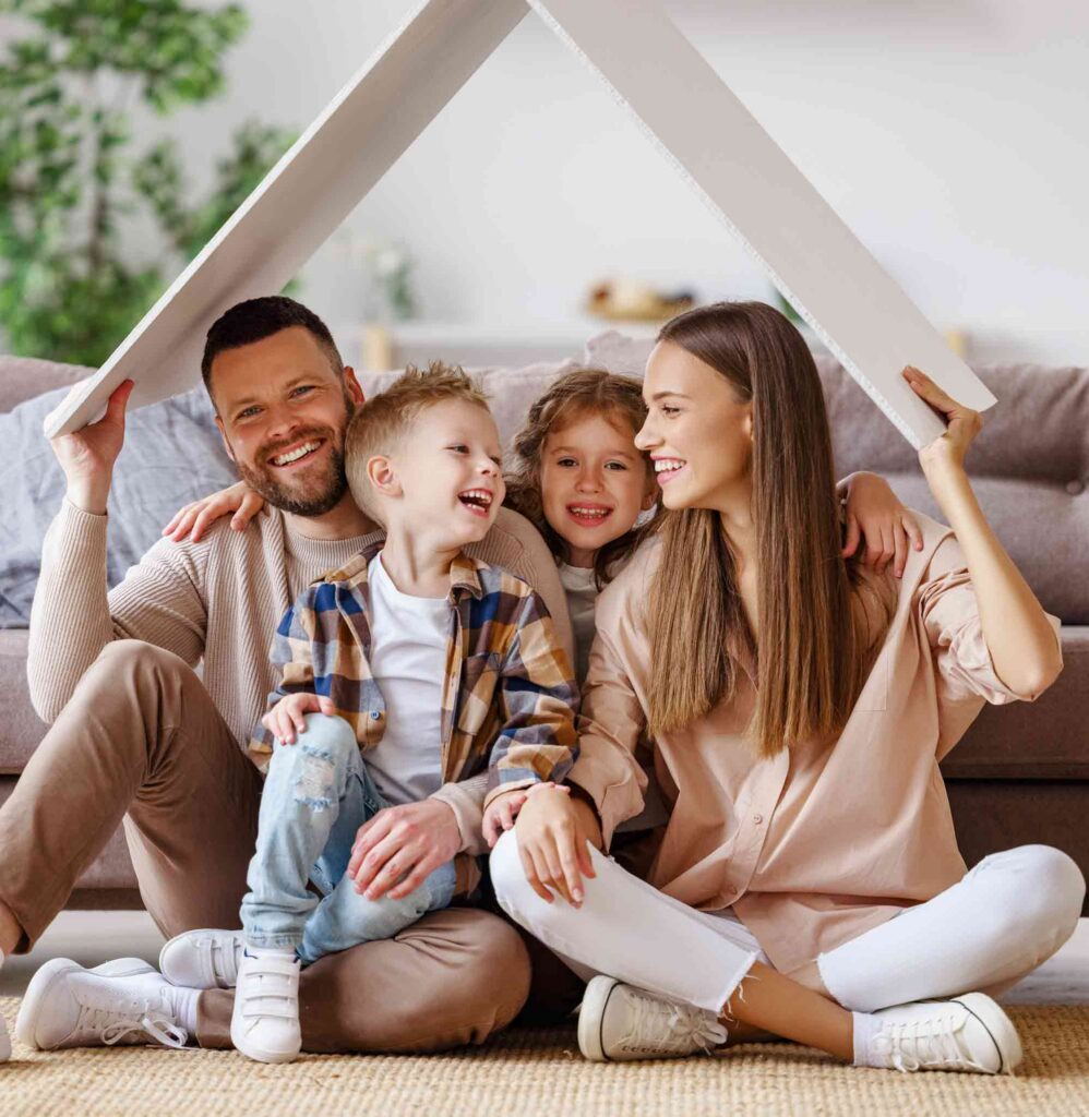 Family sitting under house roof shape discussing mortgage advice in Chelmsford