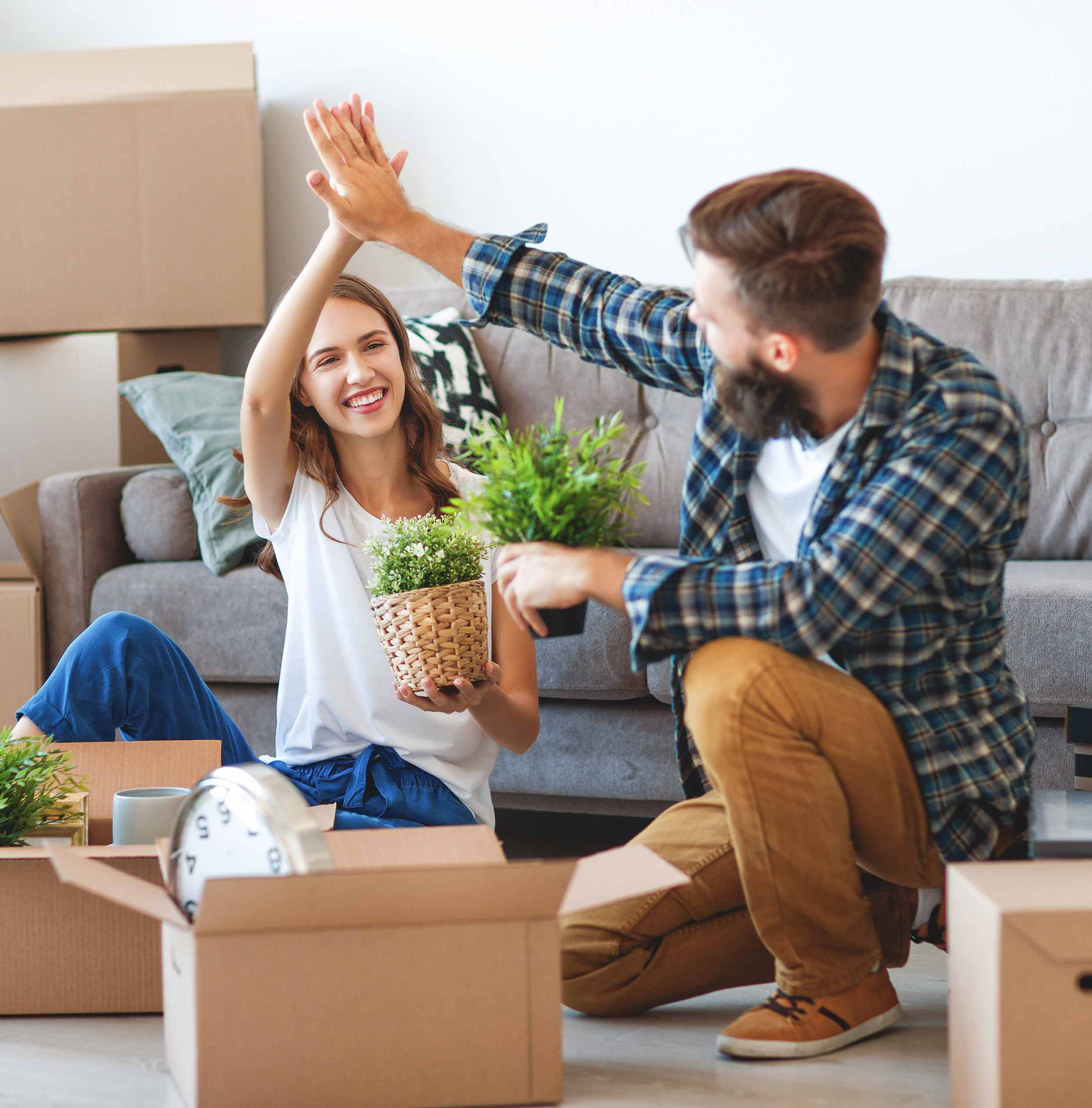 Couple moving into a new home with mortgage advice in Essex